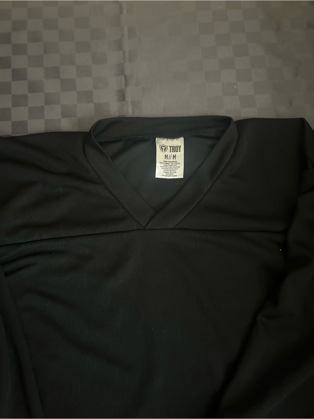 Hockey jersey with 3 pairs of socks and a bottle